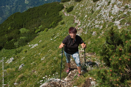 Adult woman hiking up the Oetscher in Austria, Europe 