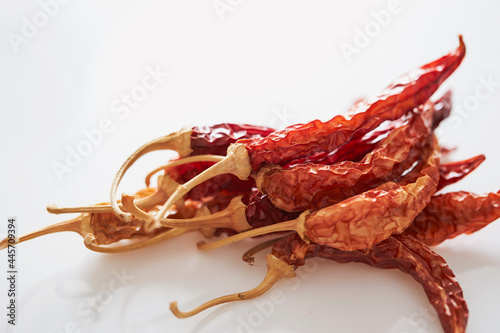 dried spicy red pepper on white background