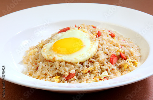 asian fried rice with egg, ham, crispy chicken and seafood in bake cheese western halal menu