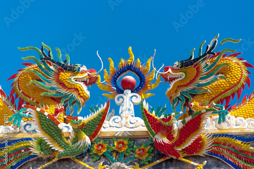chinese dragon statue on the roof