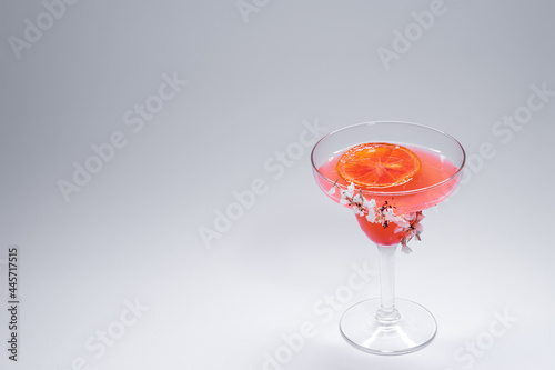 hemingway daiquiri cocktail drink with grapefruit in glass on white background photo