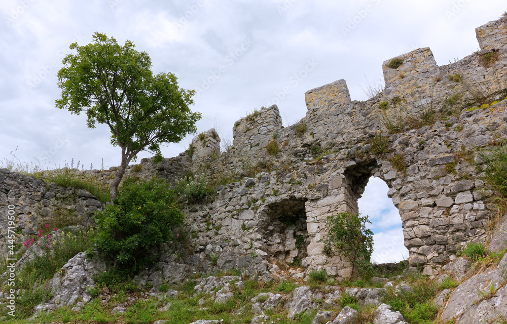 Detail of the ruins of the old medieval castle of Duino, on the rocky Adriatic coast near Trieste, Italy