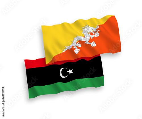 Flags of Kingdom of Bhutan and Libya on a white background