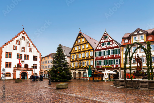 The market square in Bad Mergentheim with the Old Town Hall and the Milchlingsbrunnen Fountain is the symbol of the city of Bad Mergentheim during the Christmas holidays. Bavaria, Germany