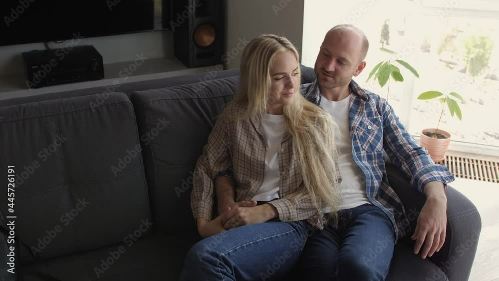 Couple Spending the Time at Home Playing Guitar Couple Spending the Time at Home Playing Guitar