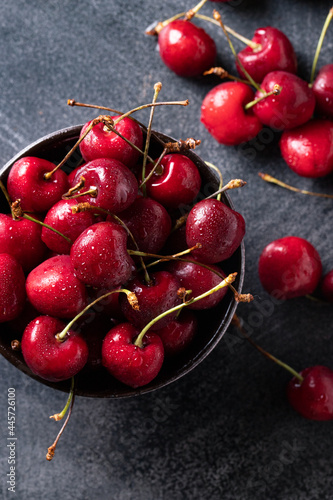 Plate of juicy fresh ripe cherries close up