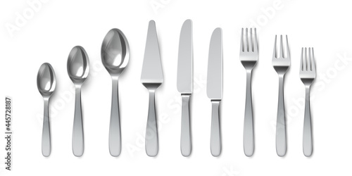 Realistic cutlery. Spoons, forks and table knives. Silverware utensil for serving. Dessert spoon and cake knife. Metal tableware vector set