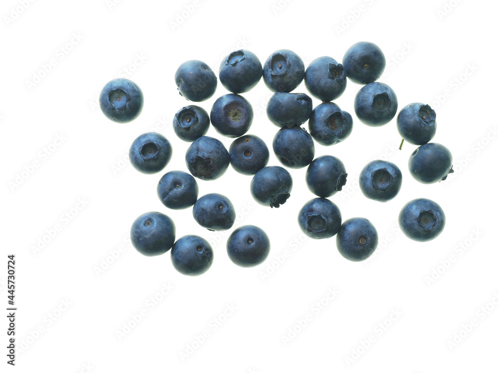 Close-up of a handful of blueberries seen against a white background Close-up of a handful of blueberries seen against a white background