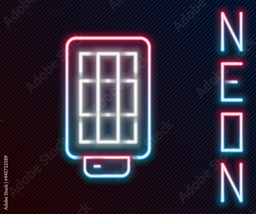 Glowing neon line Studio light bulb in softbox icon isolated on black background. Shadow reflection design. Colorful outline concept. Vector