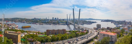 Russian city Vladivostok panoramic view on Golden Bridge and harbor