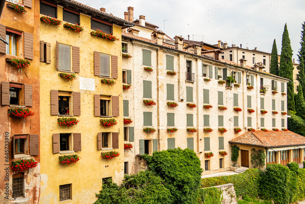 Naklejka premium View from the old bridge of the city of Bassano del Grappa on historical buildings, Vicenza - Italy