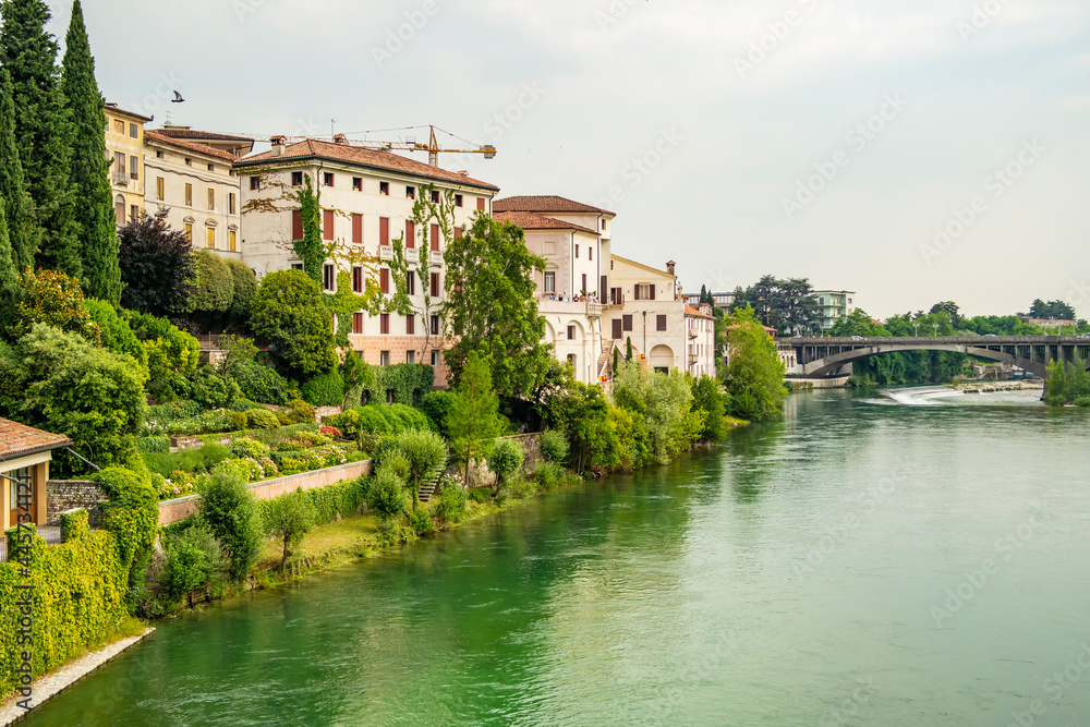View from the old bridge of the city of Bassano del Grappa on the Brenta river, Vicenza - Italy