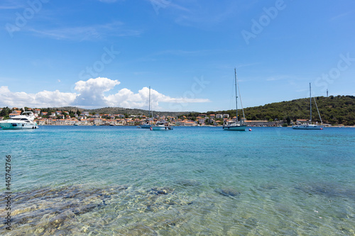 Sailing boats anchored in the wonderful, shallow, turquoise bay of Rogoznica, Croatia, popular tourist and nautical destination