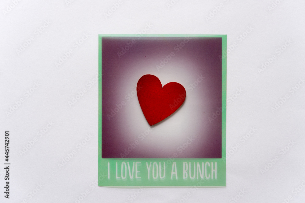 themed photo overlay with a hand-painted wooden heart on a light background and plenty of space for copy or text themed photo overlay with a hand-painted wooden heart on a light background and plenty of space for copy or text