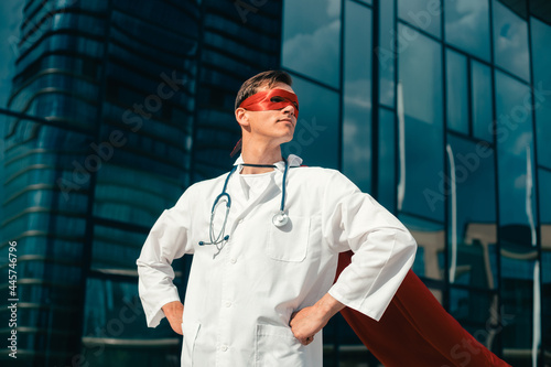 Obraz na płótnie close up. confident young doctor in a superhero Cape. w salonie