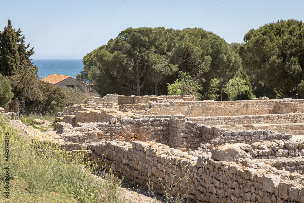 EMPURIES, SPAIN-MAY 8, 2021: Archaeological Remains of ancient city Empuries. Remains of Roman City. Archaeology Museum of Catalonia, Spain.