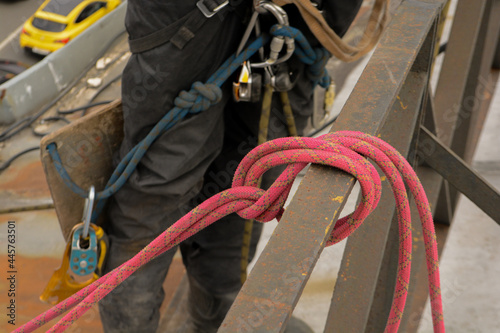 Rope for industrial mountaineering. Workflow on the roof of a building in the city center