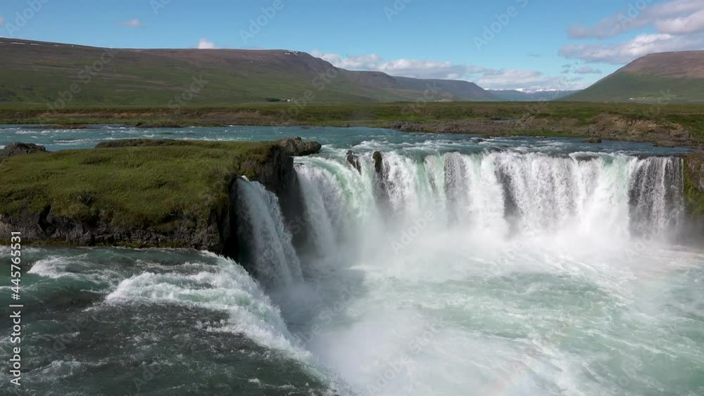A picturesque waterfall in Iceland. Idyllic view of beautiful Godafoss waterfall. It is a spectacular Icelandic waterfall on the North of Iceland. A picturesque waterfall in Iceland. Idyllic view of beautiful Godafoss waterfall. It is a spectacular Icelandic waterfall on the North of Iceland.