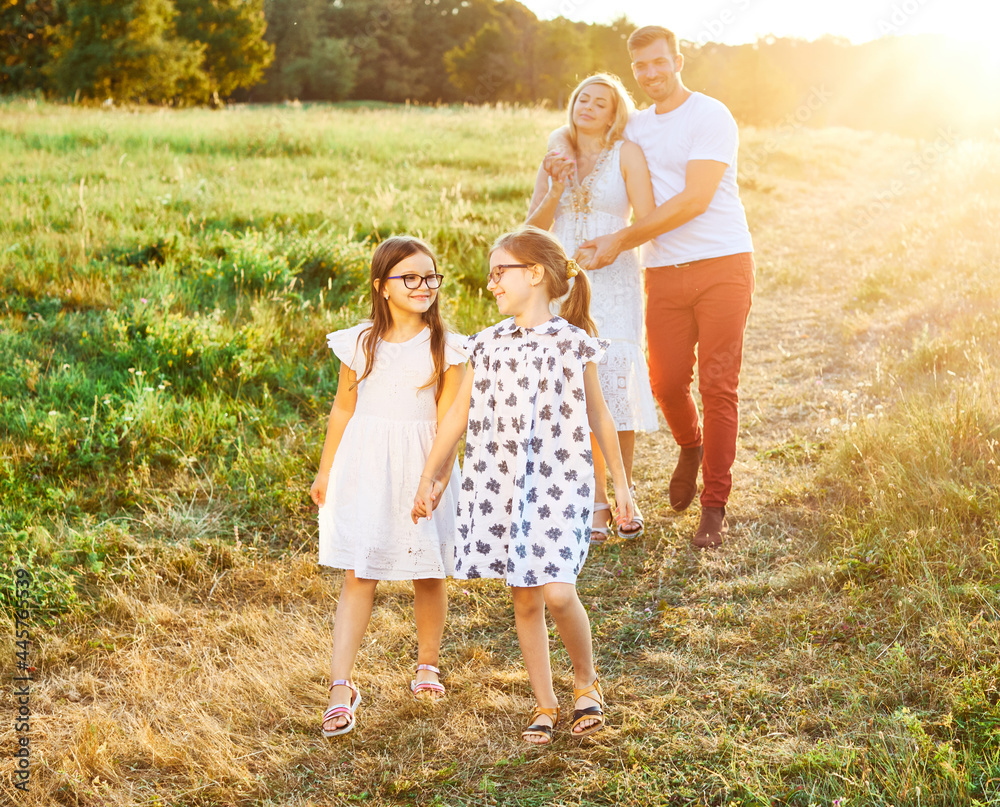Fototapeta premium child family outdoor mother woman father girl happy happiness lifestyle having fun bonding