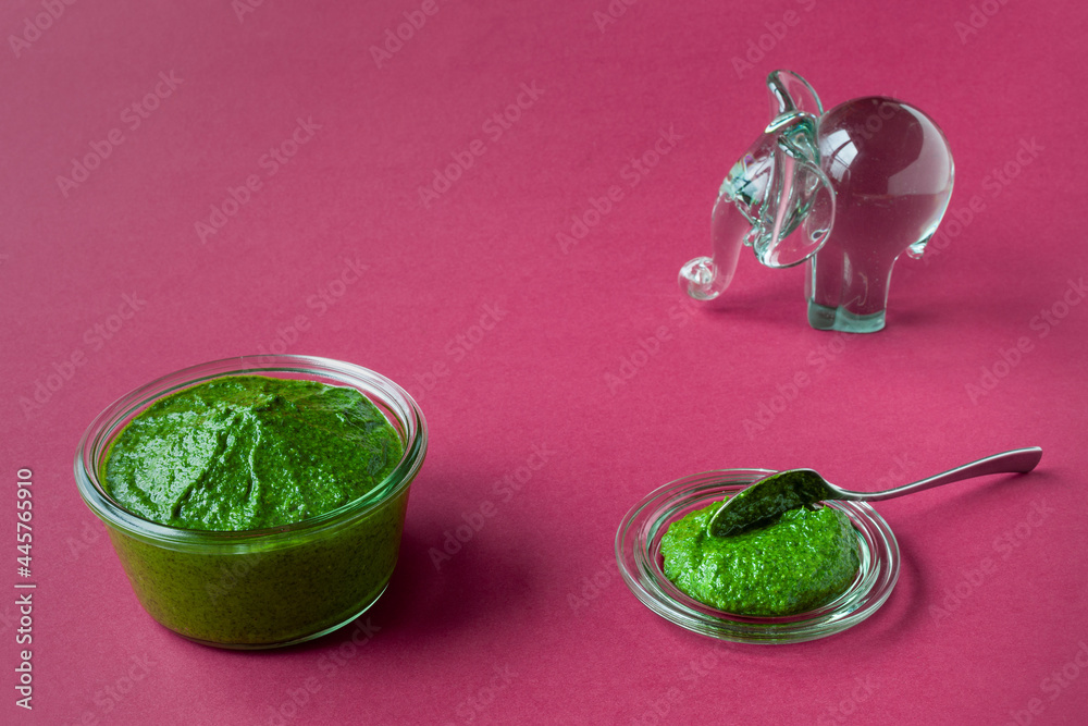 Bowl with green coriander chutney sauce dip from leaves. Indian cuisine. Bowl with green coriander chutney sauce dip from leaves. Indian cuisine.