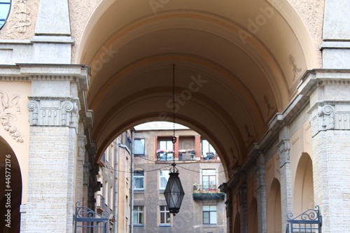 High Renaissance Arches with a hanging lantern of the Tolstoy House located at 15-17 Rubinstein Street and 54 Fontanka Embankment. designed by F. Lidval in National Romantic style photo