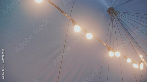 Light Bulbs Garland Close Up. Electric Bulb Shine Hanging  As Decoration