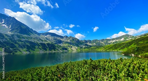 Mountain landscape by a pond in the valley Dolina Pieciu Polish Ponds, Polish Tatras © Robert