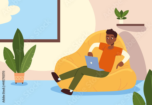 man sitting comfy bean chair