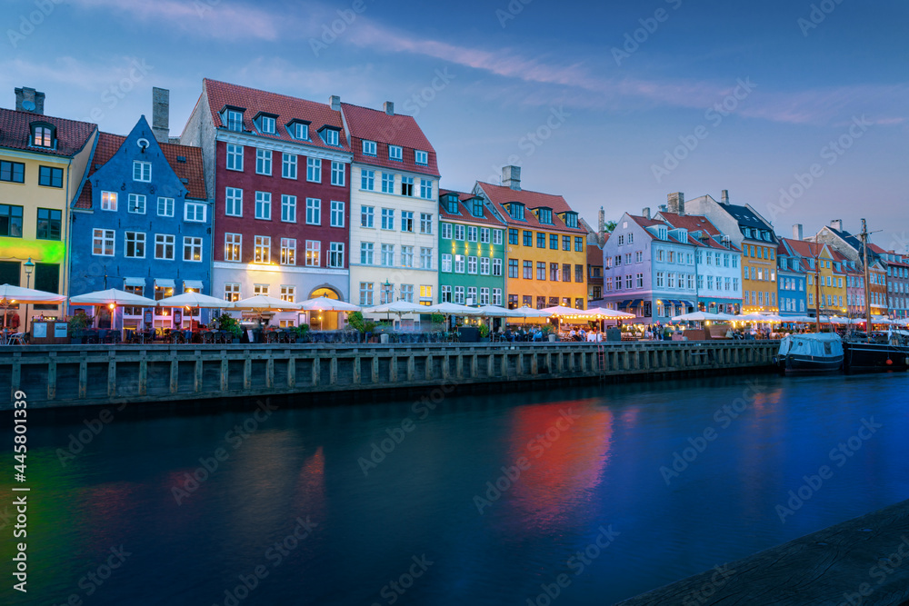 Nyhavn port and waterfront at sunset - Copenhagen, Denmark