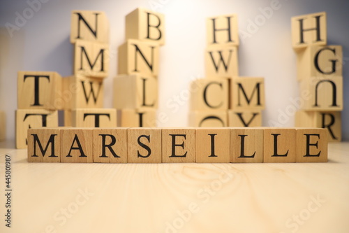 Fototapeta Naklejka Na Ścianę i Meble -  The word Marseille was created from wooden letter cubes. Cities and words.
