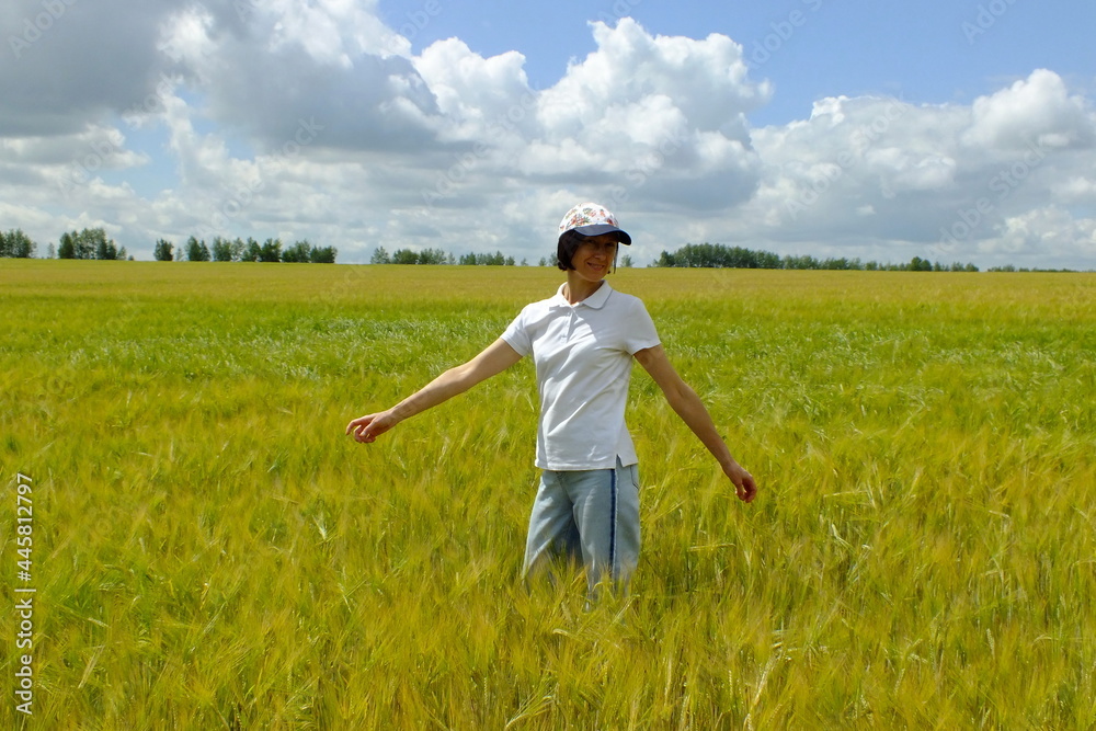 Happy woman in the field . Native spaces. Happy woman in the field . Native spaces.