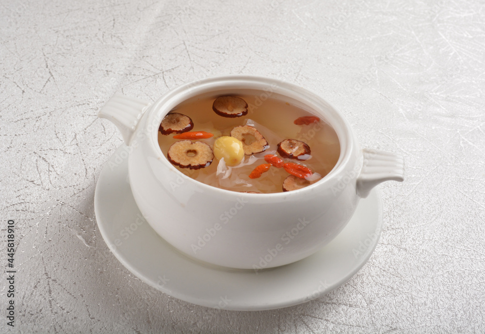 Chinese chilled hashima and herbal red dates sweet soup in white bowl asian healthy Halal dessert menu Chinese chilled hashima and herbal red dates sweet soup in white bowl asian healthy Halal dessert menu