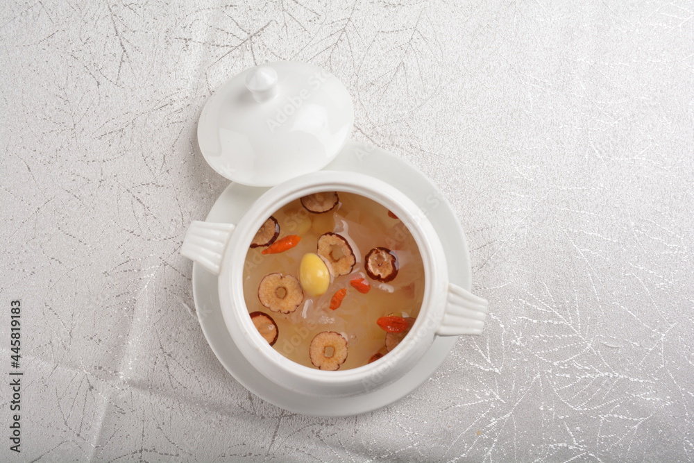 Chinese chilled hashima and herbal red dates sweet soup in white bowl asian healthy Halal dessert menu