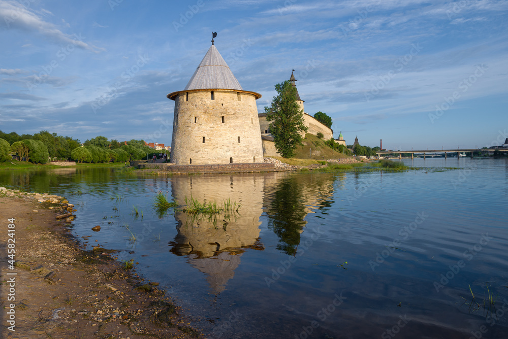 The Fat tower of the Pskov Kremlin in the cityscape on a July day. Pskov, Russia