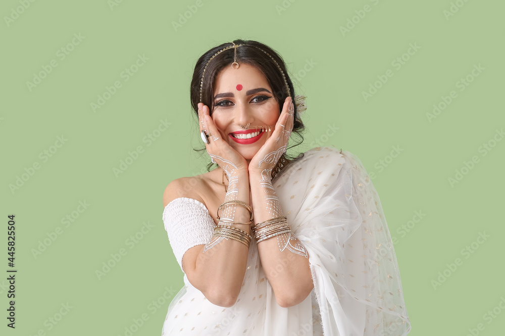 Beautiful Indian woman on color background Beautiful Indian woman on color background