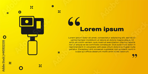 Black Action extreme camera icon isolated on yellow background. Video camera equipment for filming extreme sports. Vector