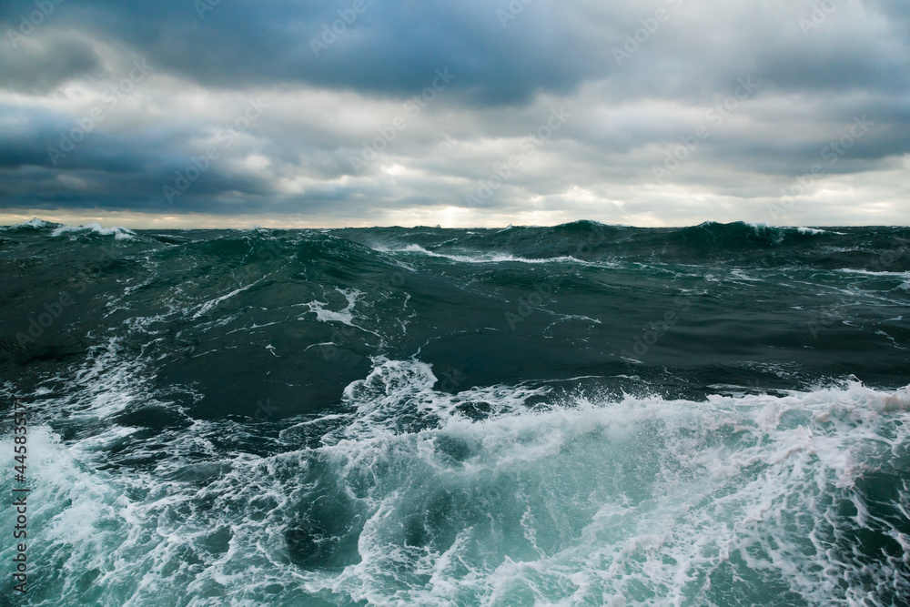 Ocean storm. Storm waves in the open ocean. Not a calm open sea.