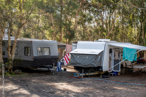 RV caravans camping at the caravan park. Camping vacation travel concept