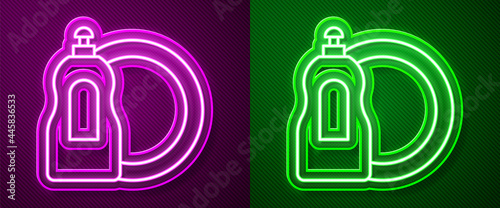 Glowing neon line Dishwashing liquid bottle and plate icon isolated on purple and green background. Liquid detergent for washing dishes. Vector