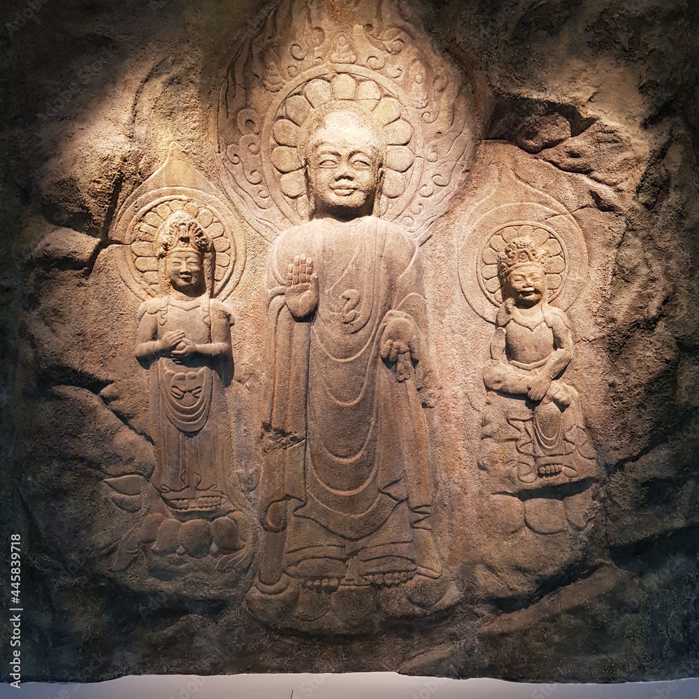 stone carving of buddha