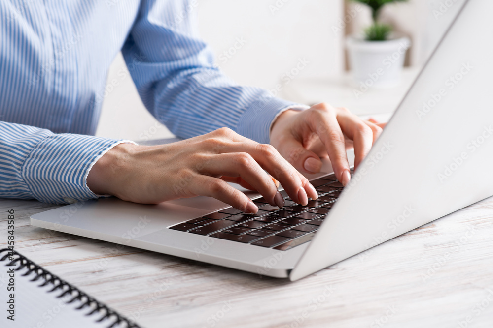 Office manager working with laptop Office manager working with laptop