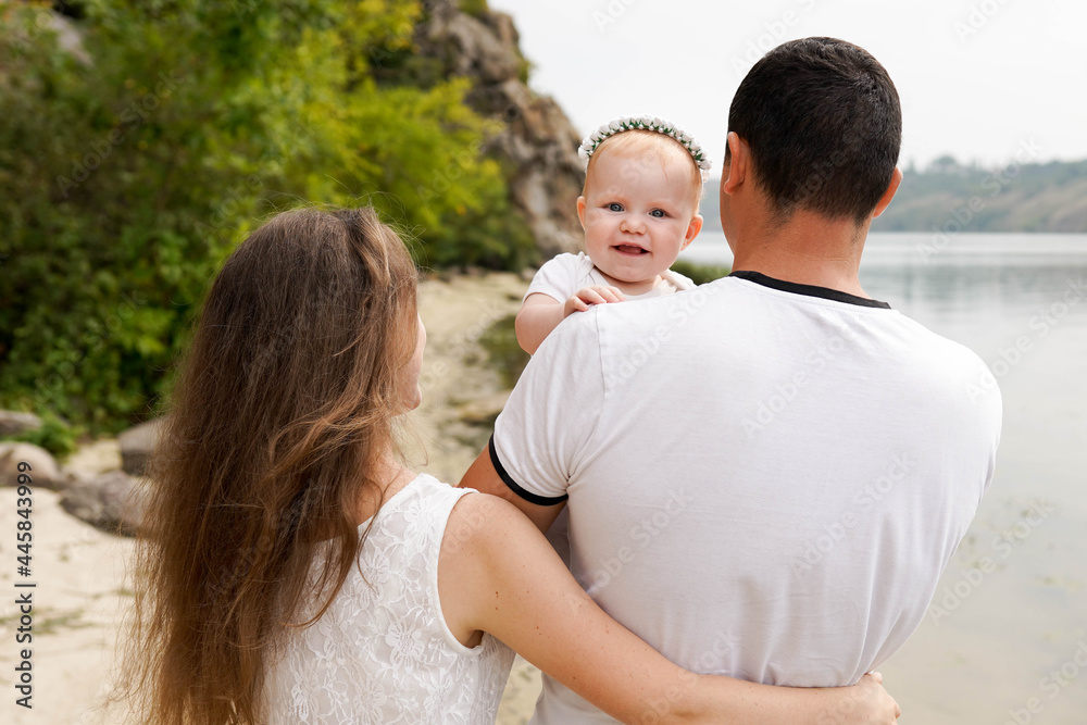 family walking outdoors. The concept of a happy family family walking outdoors. The concept of a happy family