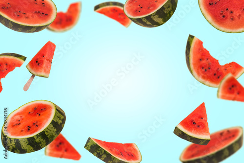 Fototapeta Naklejka Na Ścianę i Meble -  Floating, flying, levitating sliced fresh watermelon on trendy colored background with copy space.