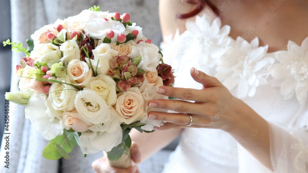 bride holding flower bouquet, close up bride holding flower bouquet, close up