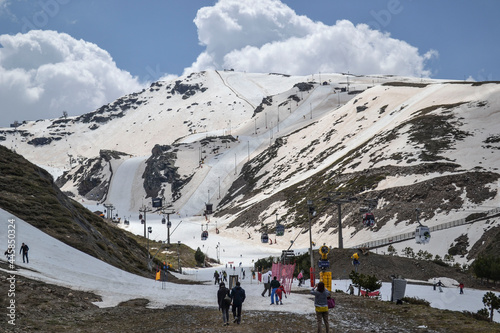 snowy mountain slopes in Pradollano de Sierra Nevada with ski lifts