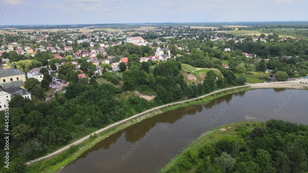 Top view of the city of Drohiczyn on the Bug River.Over the river rises the castle mounain.from the bird's eye view over the city you can see the monastery buildings-Jesuits,Frannciscans,Benedictine Top view of the city of Drohiczyn on the Bug River.Over the river rises the castle mounain.from the bird's eye view over the city you can see the monastery buildings-Jesuits,Frannciscans,Benedictine
