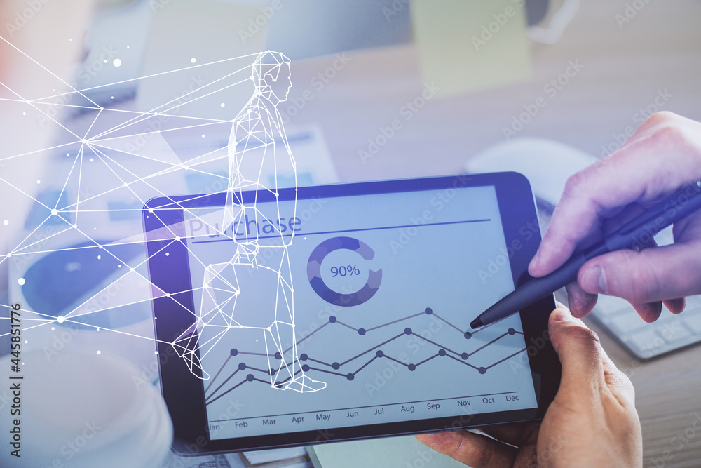 Double exposure of man's hands holding and using a mobile device and creative hologram drawing. Double exposure of man's hands holding and using a mobile device and creative hologram drawing.