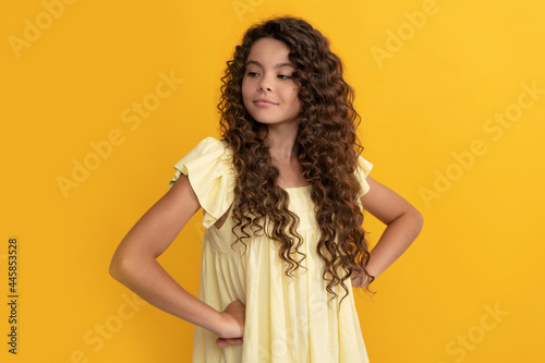 arrogant kid with long curly hair and perfect skin, portrait