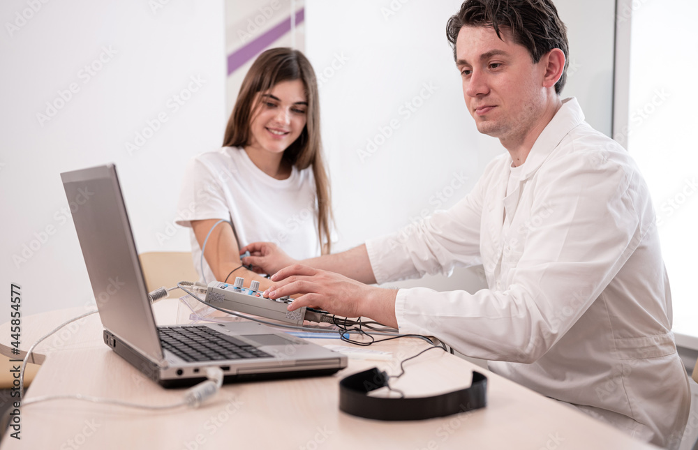 Patient nerves testing using electromyography at medical center Patient nerves testing using electromyography at medical center
