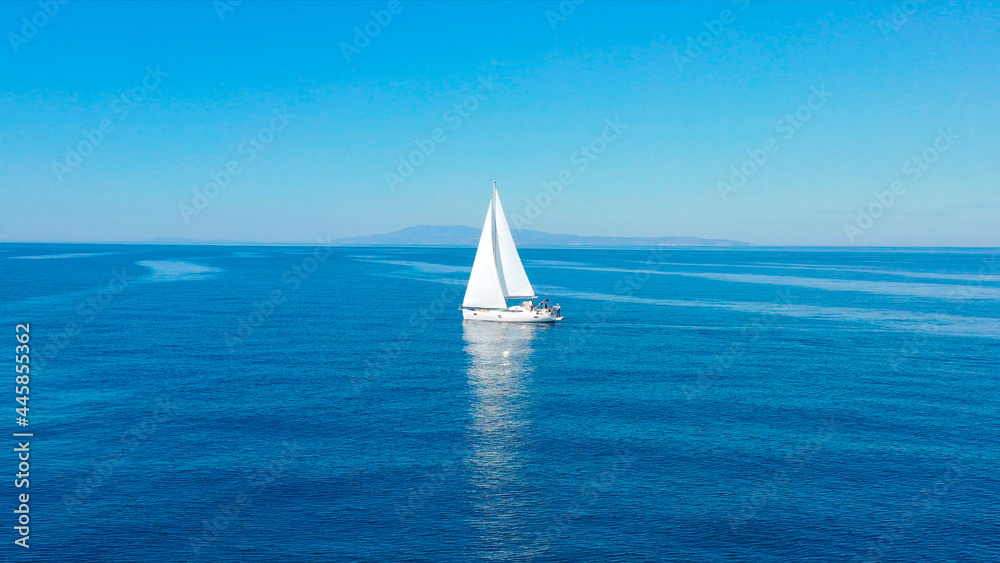 Obraz premium Aerial view of sailing luxury yacht at opened sea at sunny day in Croatia